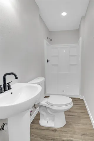 a bathroom with a sink and a toilet