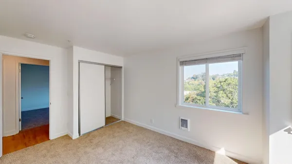 an empty room with windows