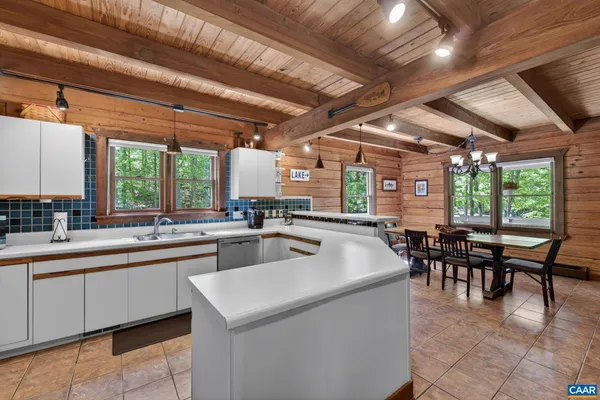 a kitchen with a stove and a microwave
