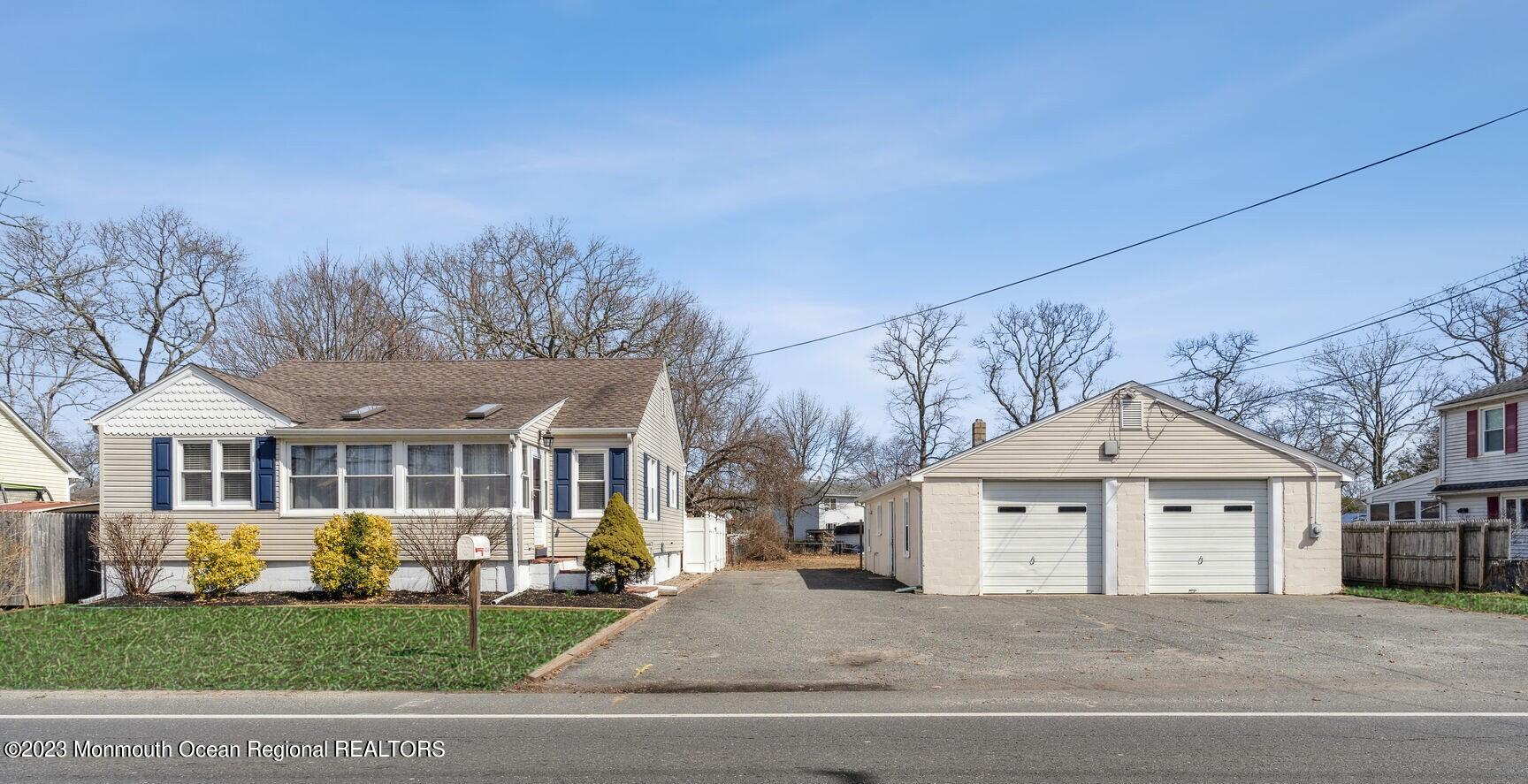 414 Drum Point Road Brick, NJ 08723 - Photo 2 of 16 grass1