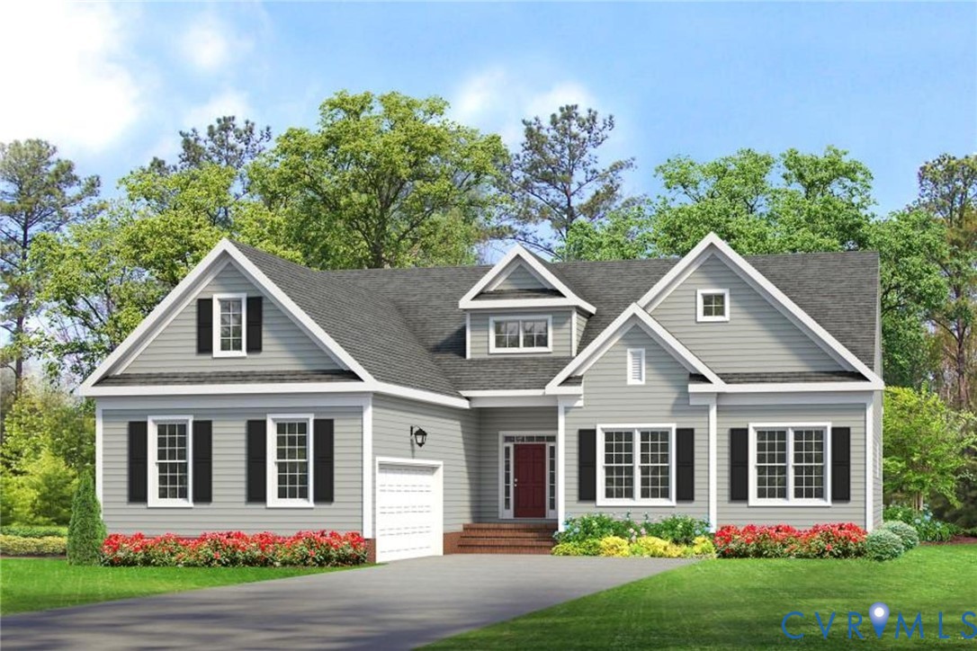 7751 Dandridge Drive Quinton, VA 23141 - Photo 1 of 19 a front view of a house with garden