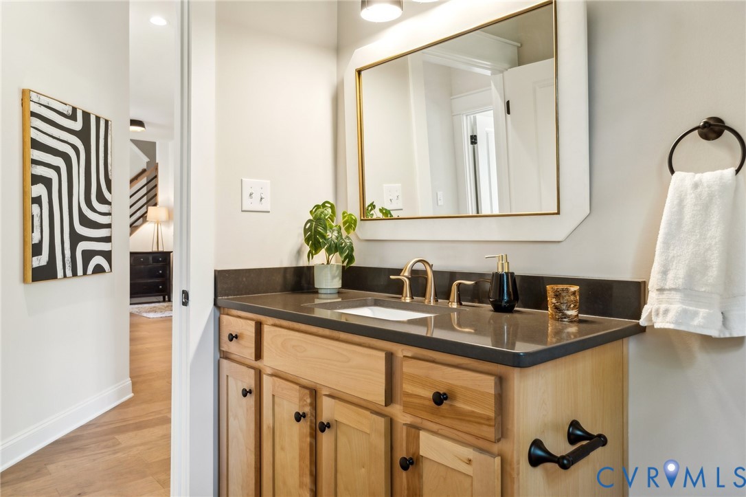 7751 Dandridge Drive Quinton, VA 23141 - Photo 15 of 19 a bathroom with a sink and a mirror