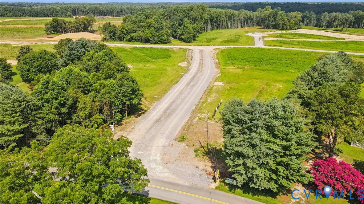 7751 Dandridge Drive Quinton, VA 23141 - Photo 19 of 19 a view of a swimming pool and a lawn chairs
