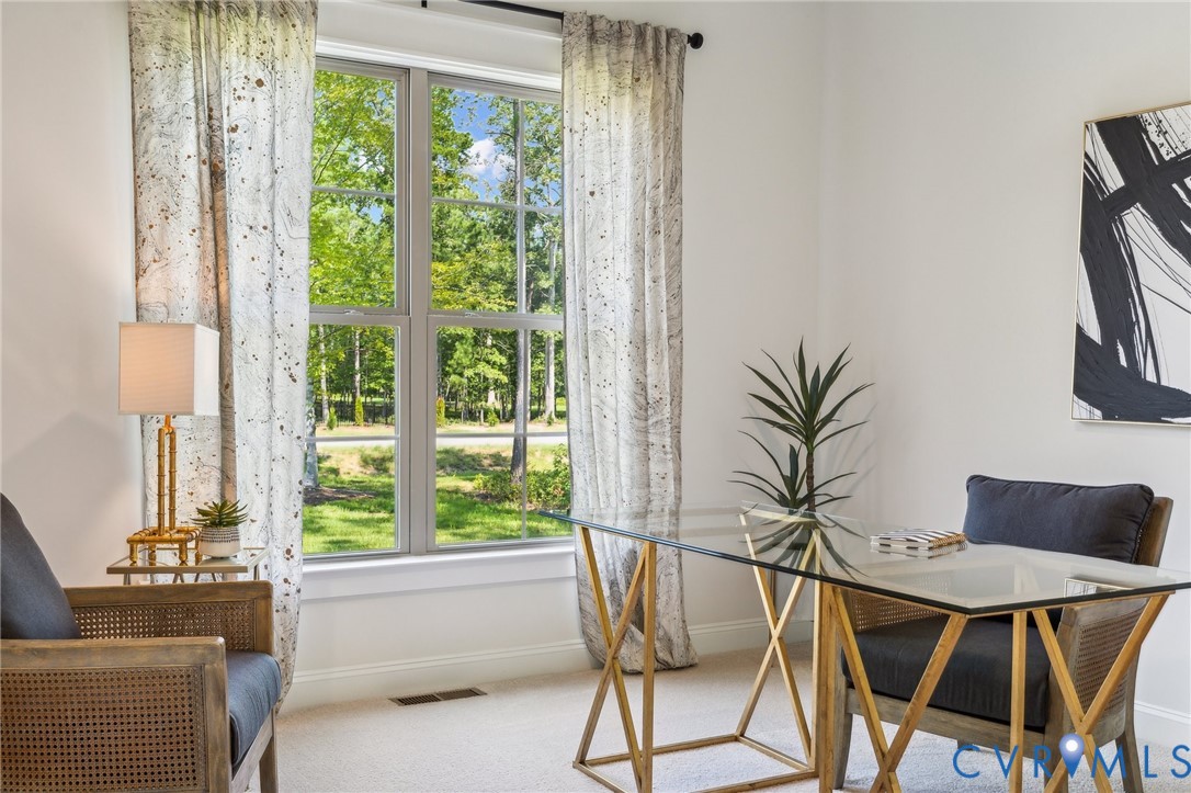 7751 Dandridge Drive Quinton, VA 23141 - Photo 7 of 19 a living room with furniture and a window