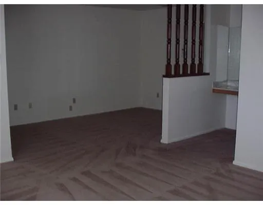 a view of a storage & utility room with wooden floor