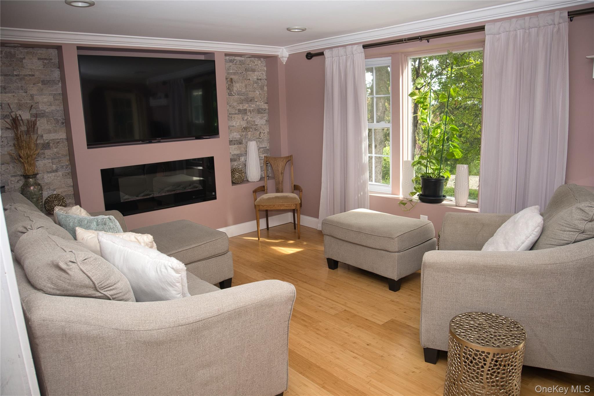 Large bay window with lots of natural light.
