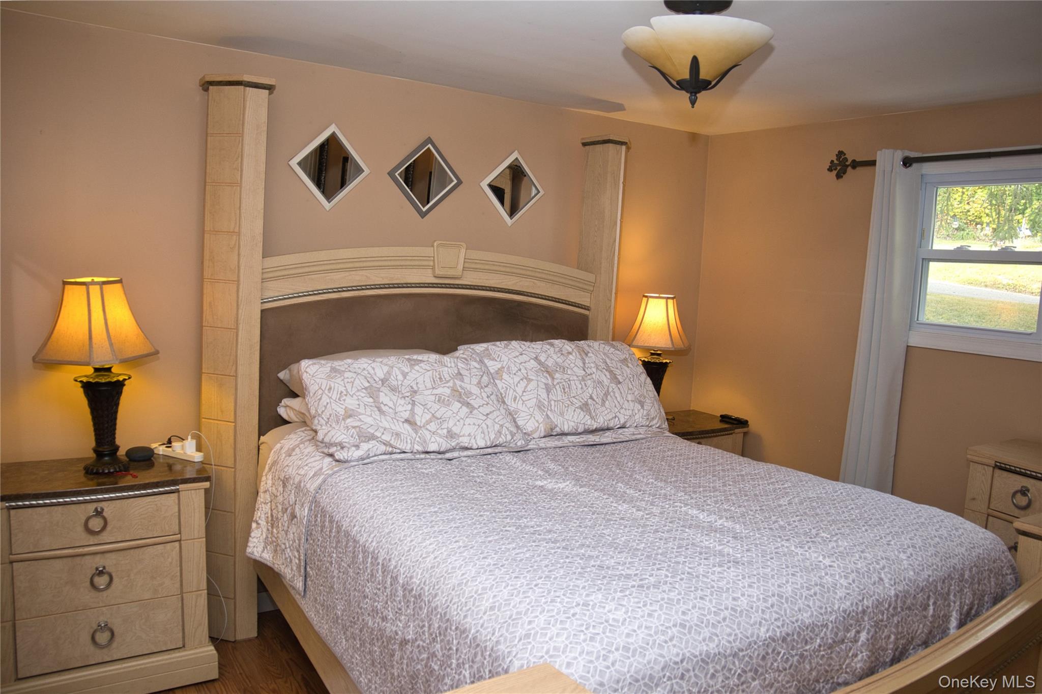 165 Lattintown Road, Unit 75 Newburgh, NY 12550 - Photo 11 of 24 Bedroom with dark wood-type flooring