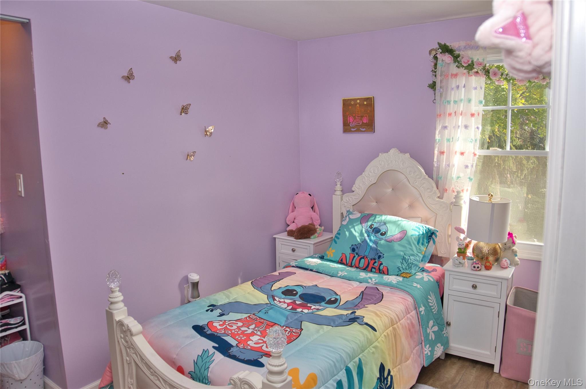 165 Lattintown Road, Unit 75 Newburgh, NY 12550 - Photo 14 of 24 2nd Bedroom shows lot of light and wood floors.