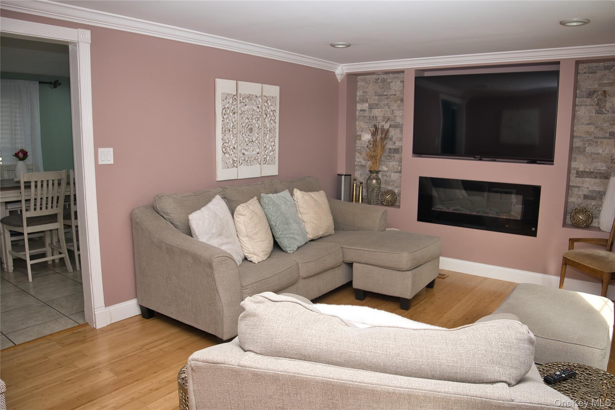 165 Lattintown Road, Unit 75 Newburgh, NY 12550 - Photo 2 of 24 Features Electric fireplace and side built-in shelves.