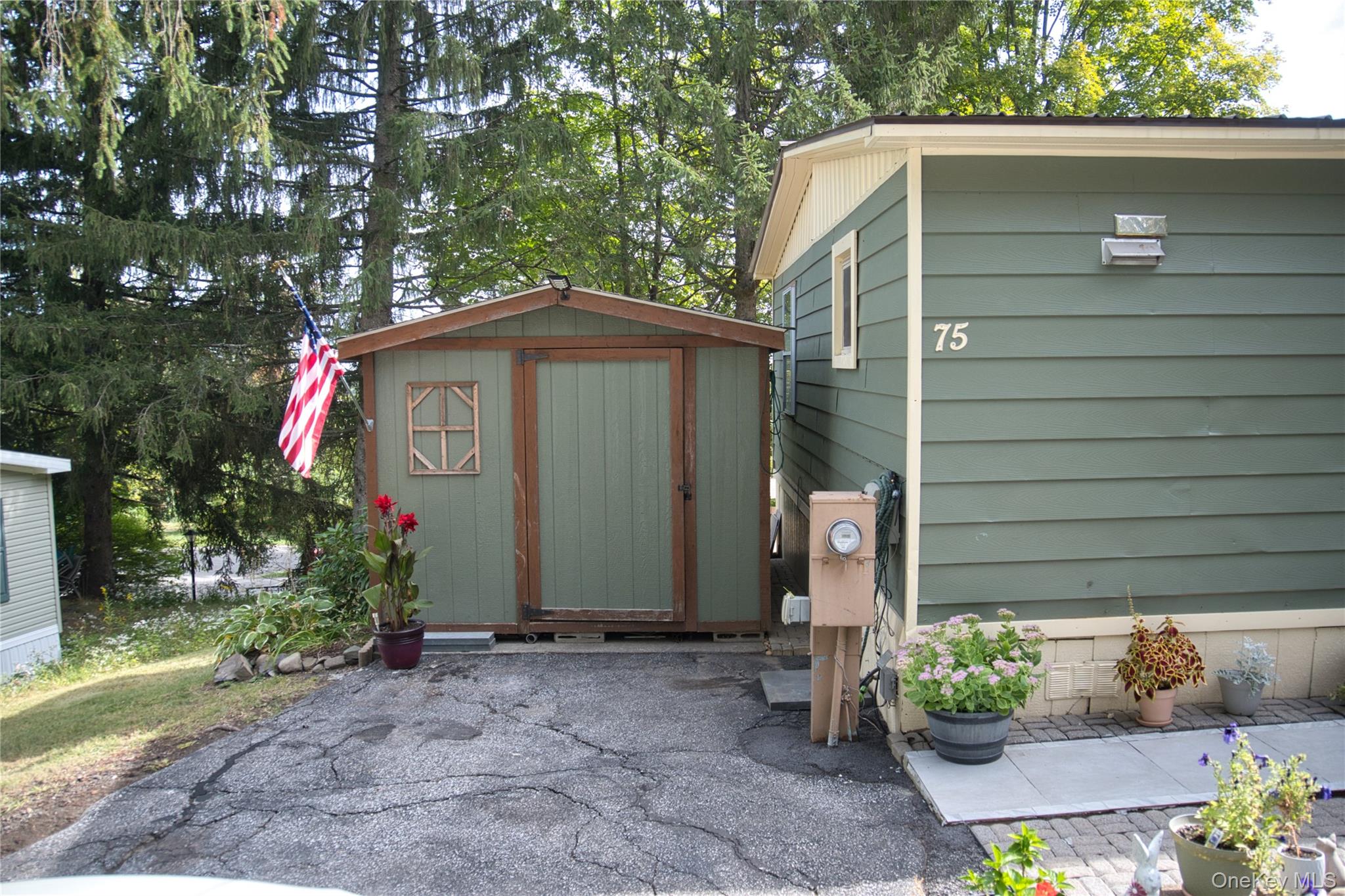 165 Lattintown Road, Unit 75 Newburgh, NY 12550 - Photo 23 of 24 Large shed great for outdoor tools and equipment