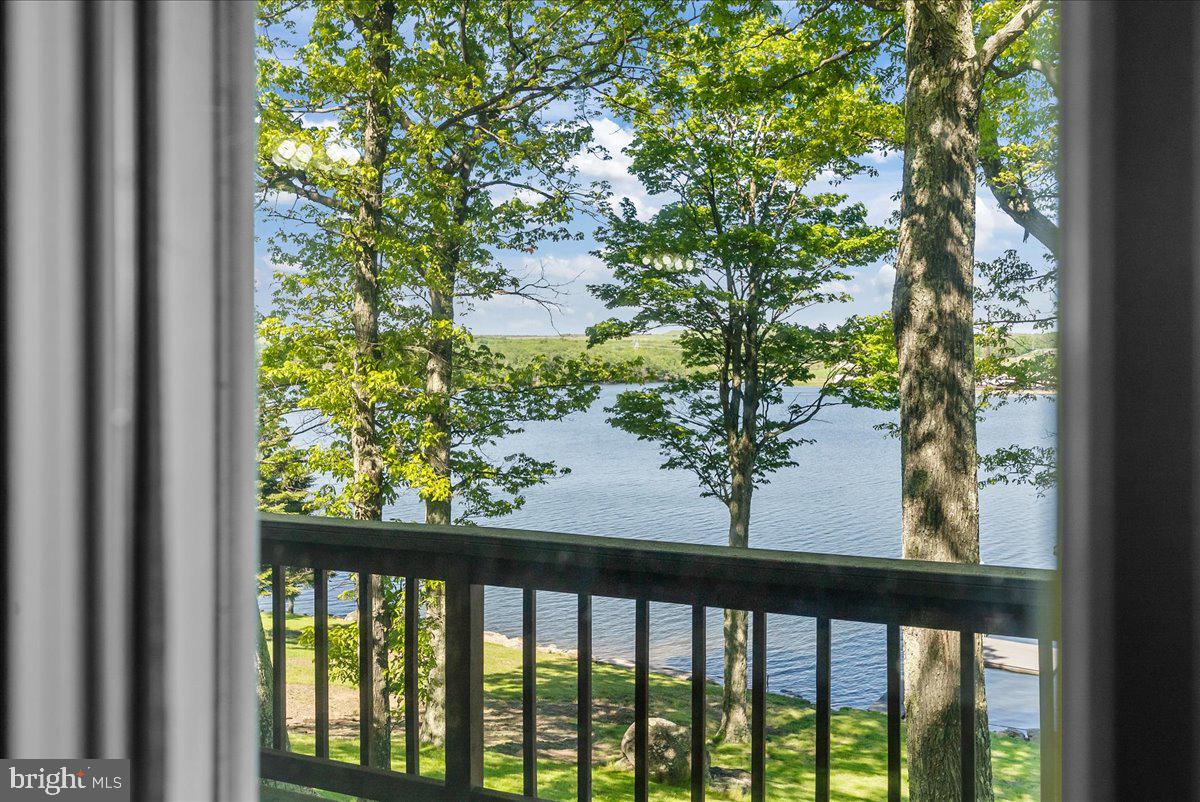663 Bear Woods Road Mount Storm, WV 26739 - Photo 12 of 73 Tranquil lakeside retreat view.