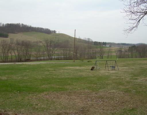 384 Lindsay Run Road Spring Church, PA 15686 - Photo 2 of 16 Yard/Garden. Looking out from the front deck, at the spacious front yard.