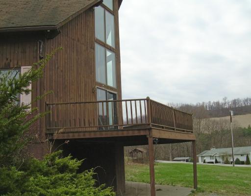 384 Lindsay Run Road Spring Church, PA 15686 - Photo 15 of 16 Patio/Deck. The front wrap-around deck, accessed by the Great Room and Dining area, is a wonderful place to enjoy the quiet countryside.
