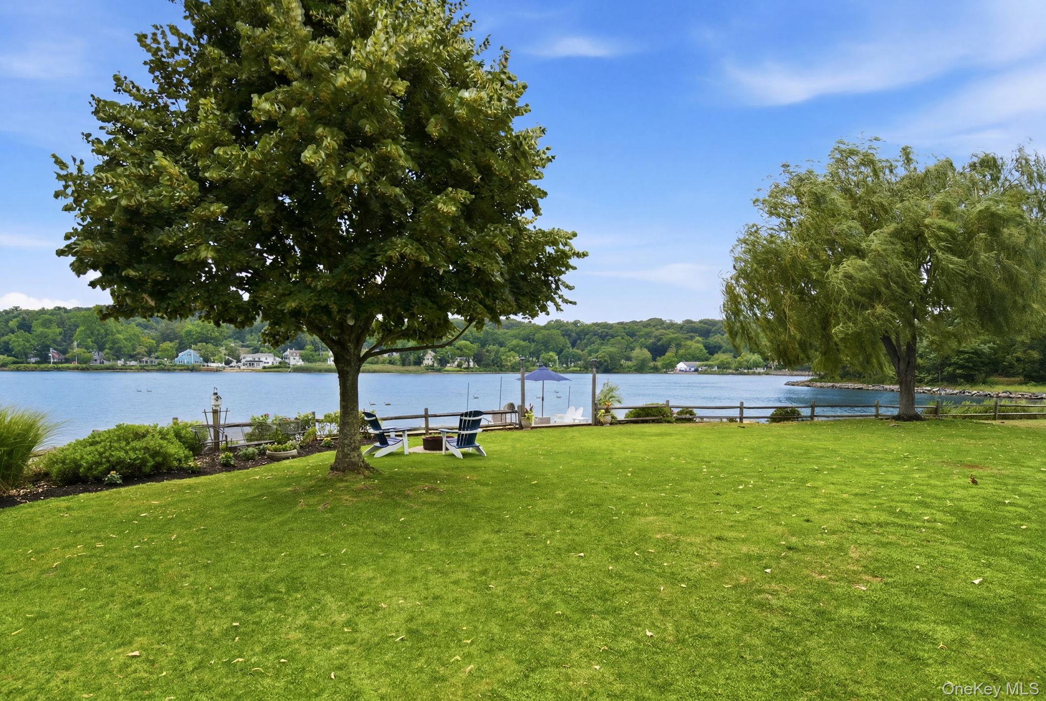33 Prospect Road Centerport, NY 11721 - Photo 35 of 48 Sprawling lawn with stunning pond views.