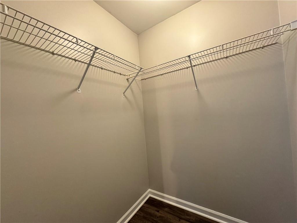 204 Park Place Woodstock, GA 30189 - Photo 13 of 22 a view of a room with racks on the wall