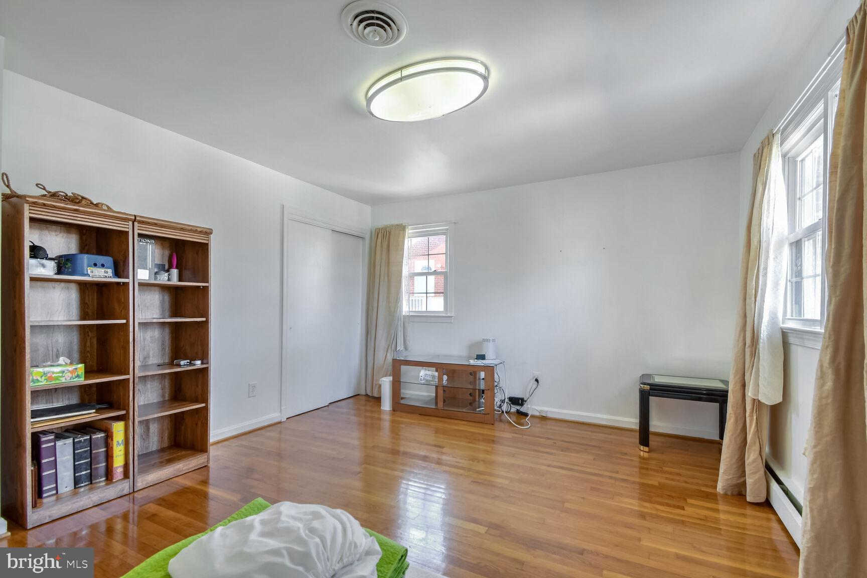 1113 Brantford Avenue Silver Spring, MD 20904 - Photo 16 of 35 a view of a livingroom with furniture and closet