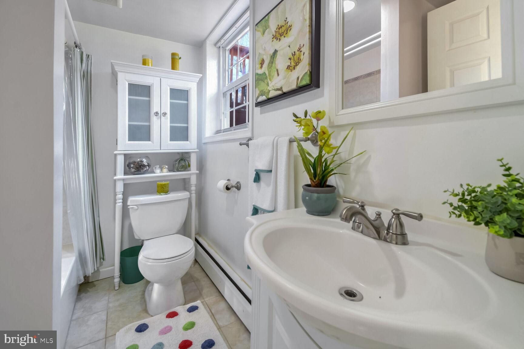 1113 Brantford Avenue Silver Spring, MD 20904 - Photo 22 of 35 a bathroom with a sink toilet and shower