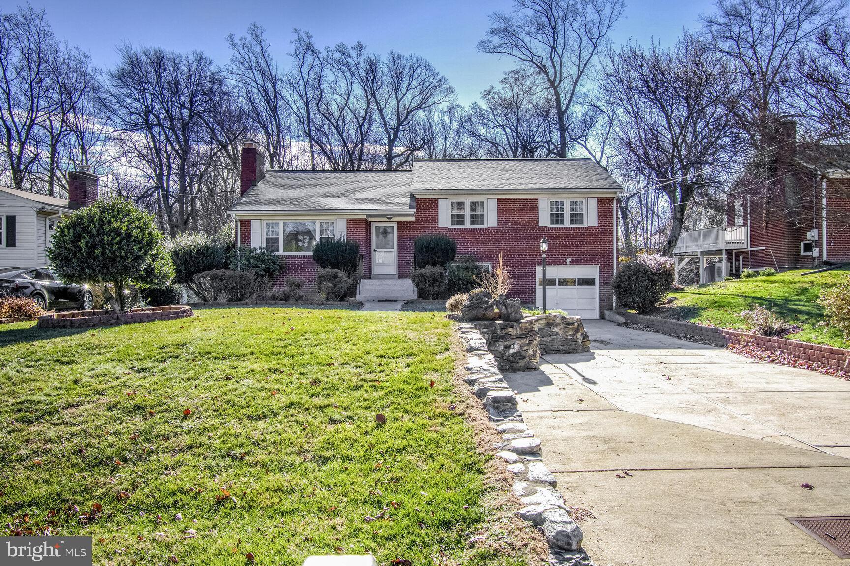1113 Brantford Avenue Silver Spring, MD 20904 - Photo 3 of 35 a view of a house with a yard