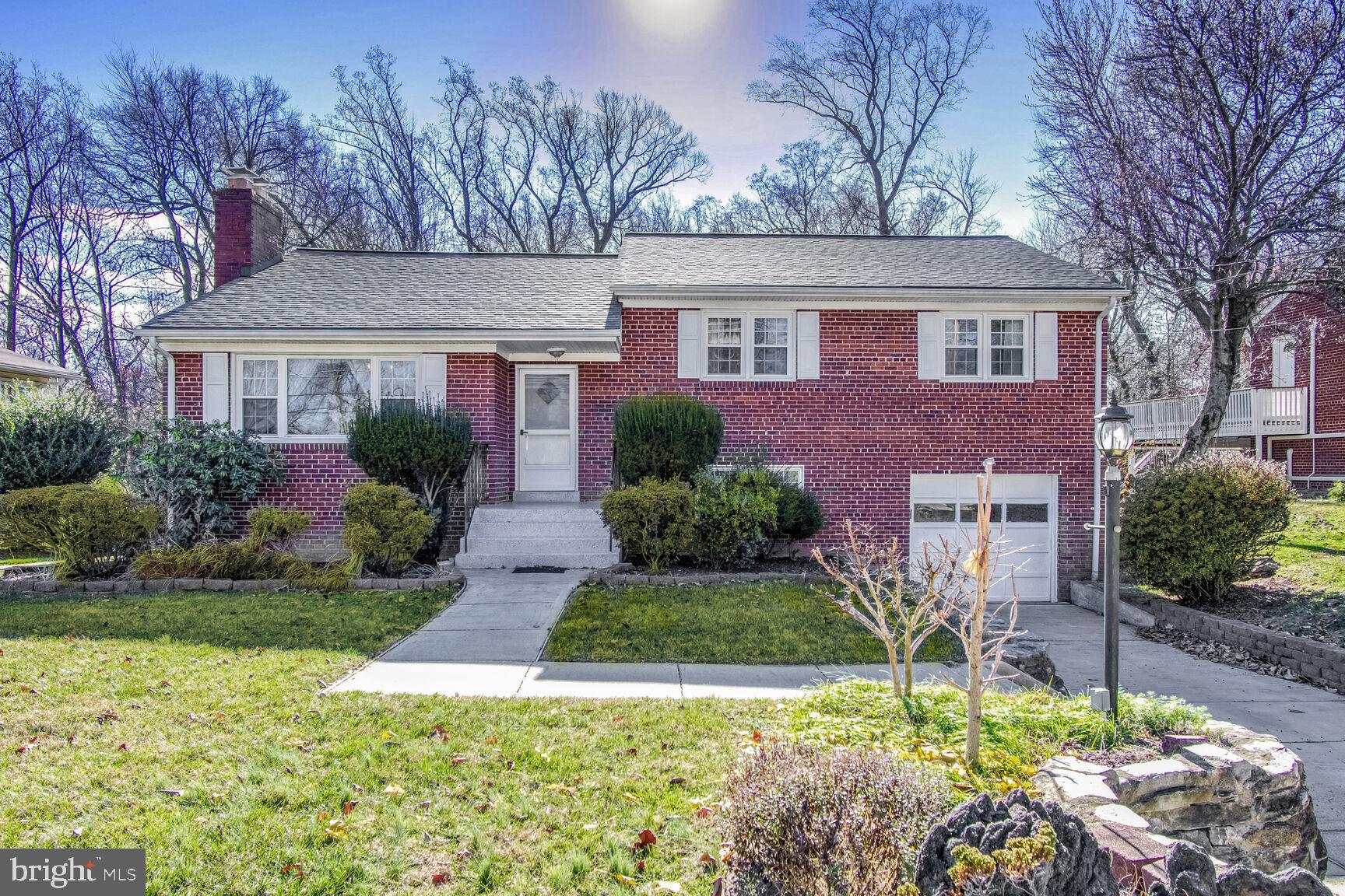 1113 Brantford Avenue Silver Spring, MD 20904 - Photo 4 of 35 a front view of a house with a yard