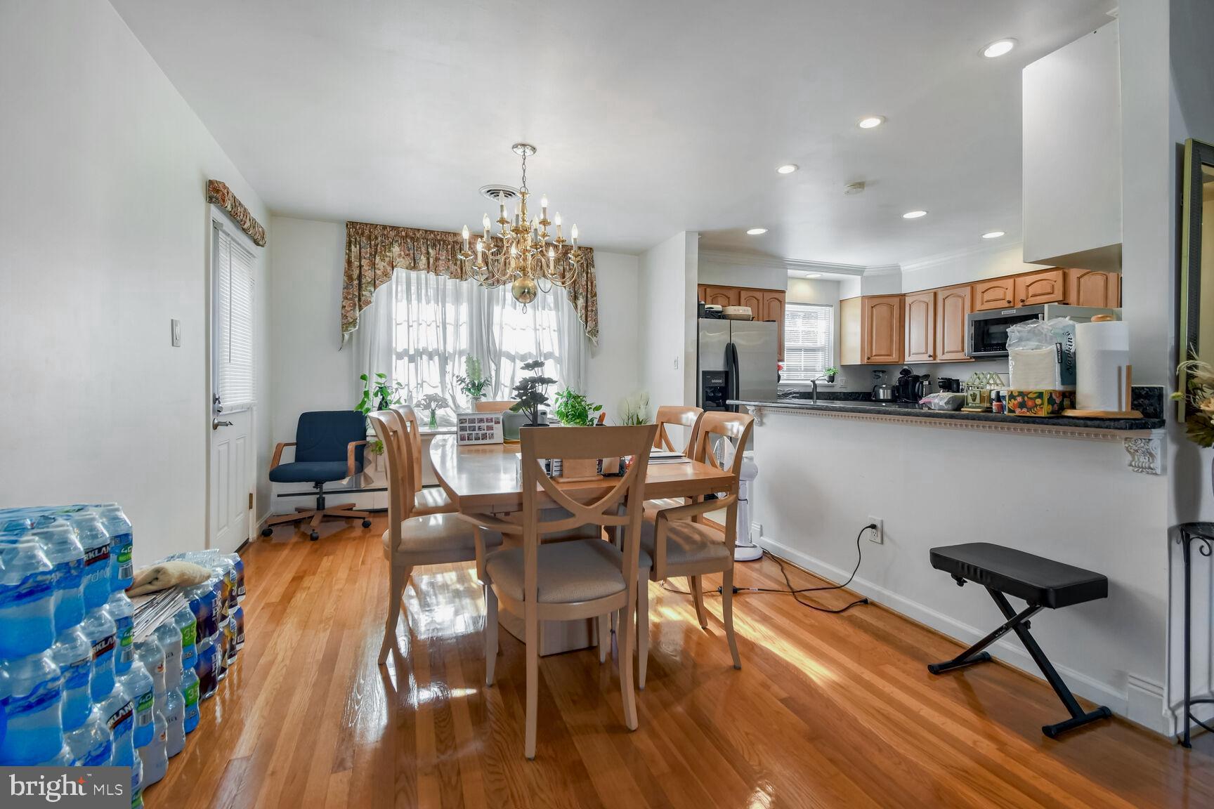 1113 Brantford Avenue Silver Spring, MD 20904 - Photo 9 of 35 a view of a dining room with furniture and chandelier