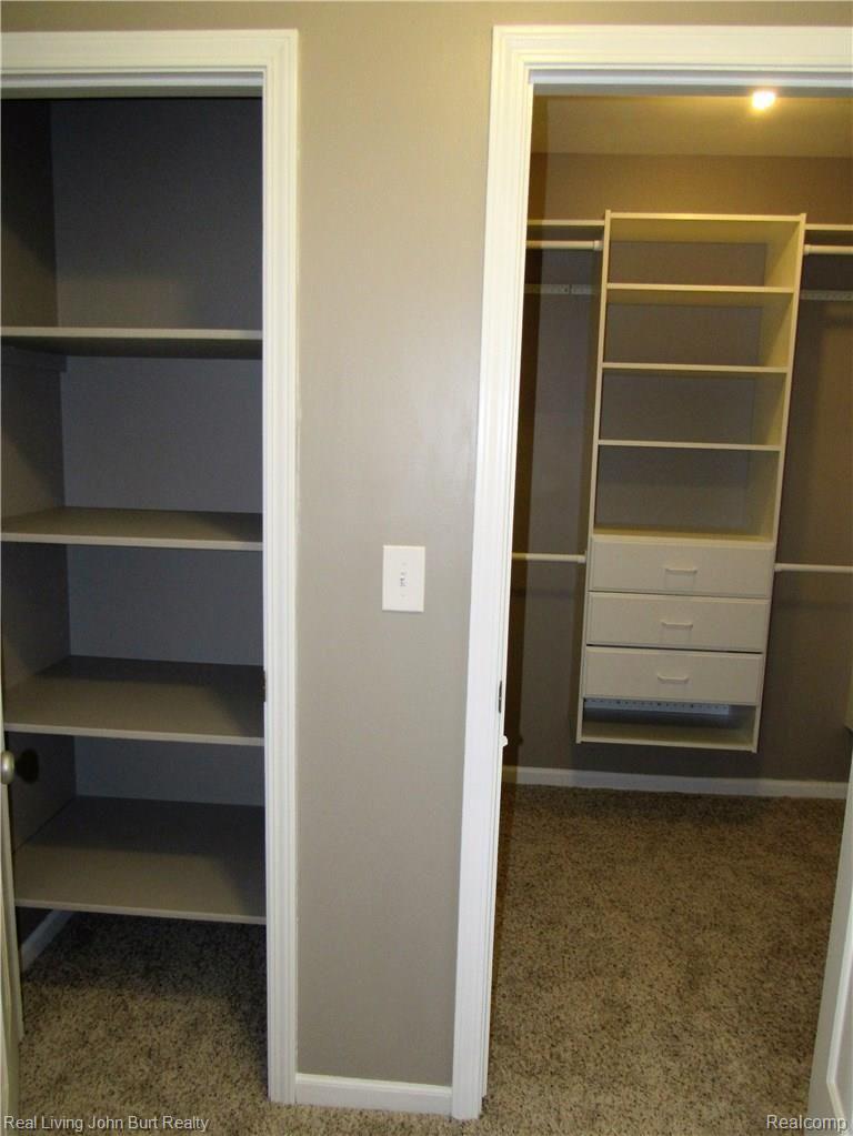4849 Herd Road Metamora, MI 48455 - Photo 33 of 42 master linen closet & walkin closet