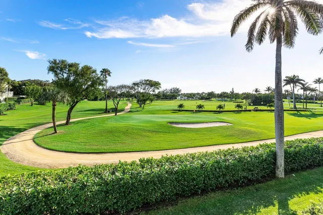 a view of a golf course with a garden