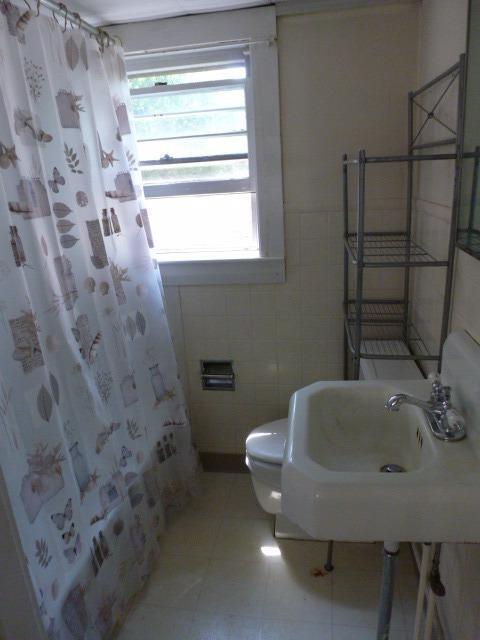 5 Hideaway Road, Unit 5G Buzzards Bay, MA 02532 - Photo 11 of 13 a bathroom with a sink and a toilet