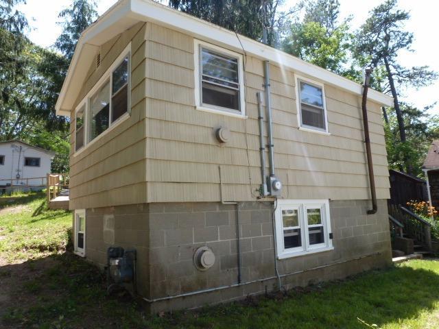 5 Hideaway Road, Unit 5G Buzzards Bay, MA 02532 - Photo 4 of 13 a view of a house with a yard