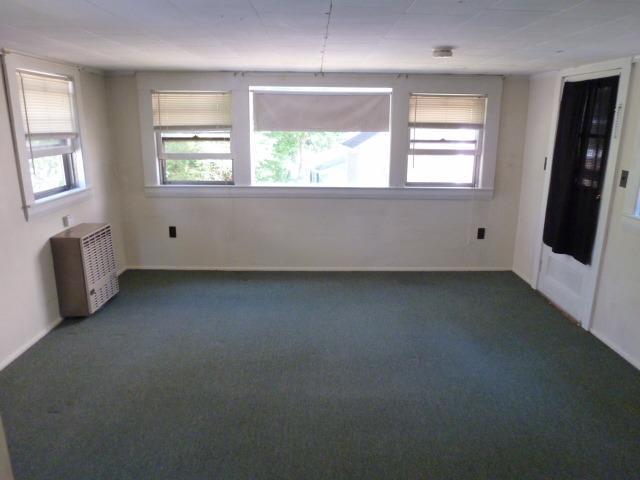 5 Hideaway Road, Unit 5G Buzzards Bay, MA 02532 - Photo 8 of 13 an empty room with windows