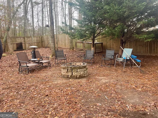 a view of backyard with tree