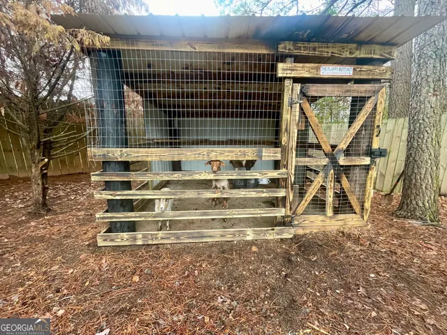 a view of car parked in front of house