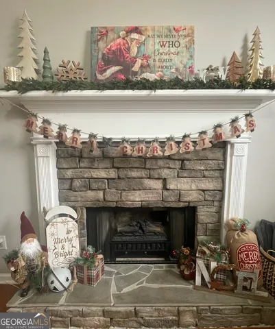 a close view of a fireplace with wooden floor