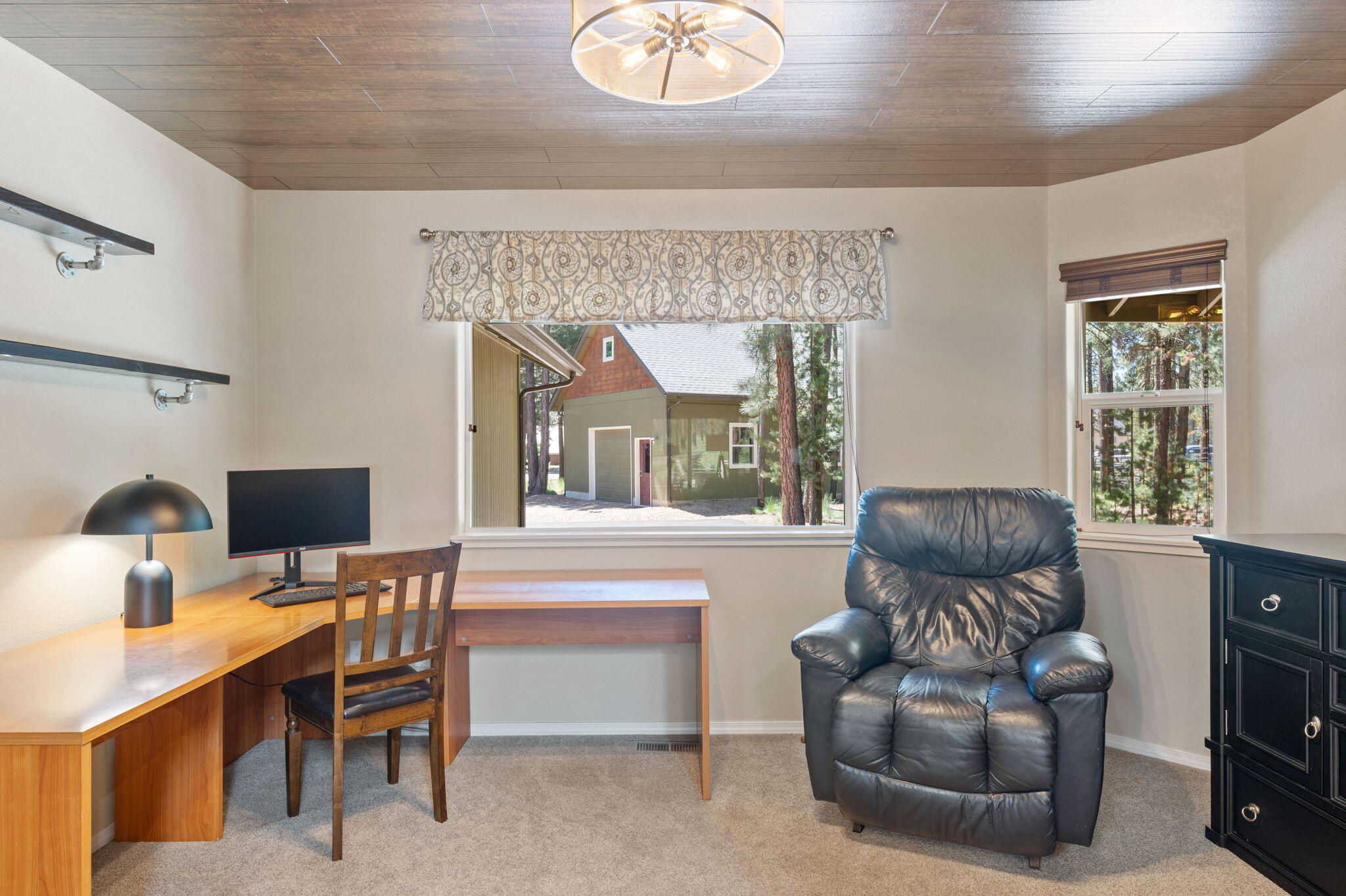 16938 Quartz Hill Road Bend, OR 97707 - Photo 26 of 52 a work room with furniture and a window