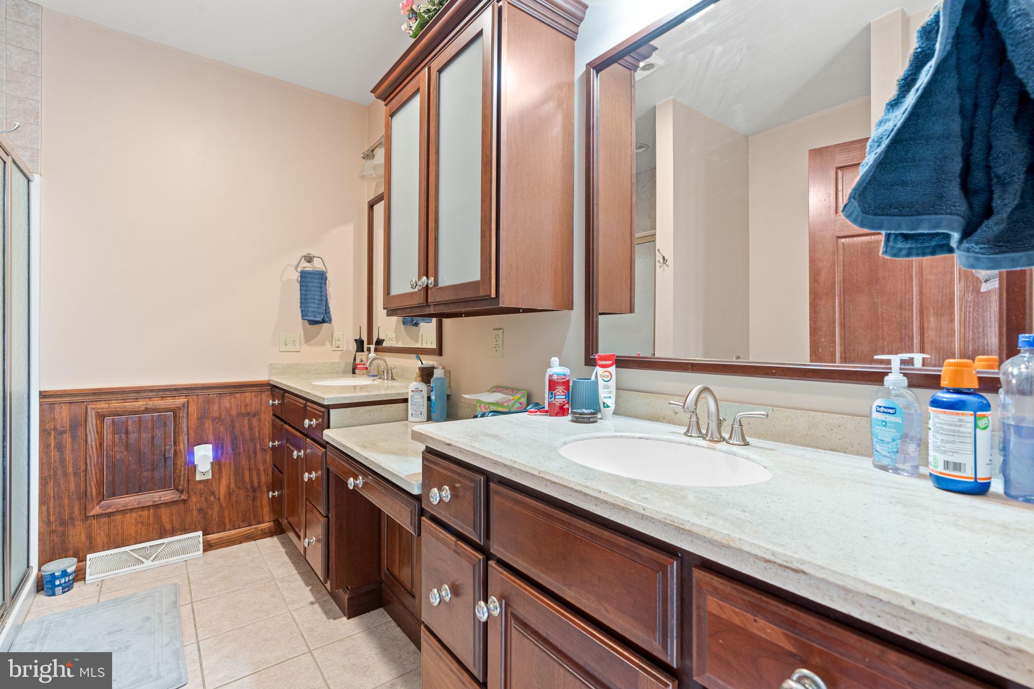 170 Sunset Road Oxford, PA 19363 - Photo 27 of 70 a bathroom with a double vanity sink and a mirror