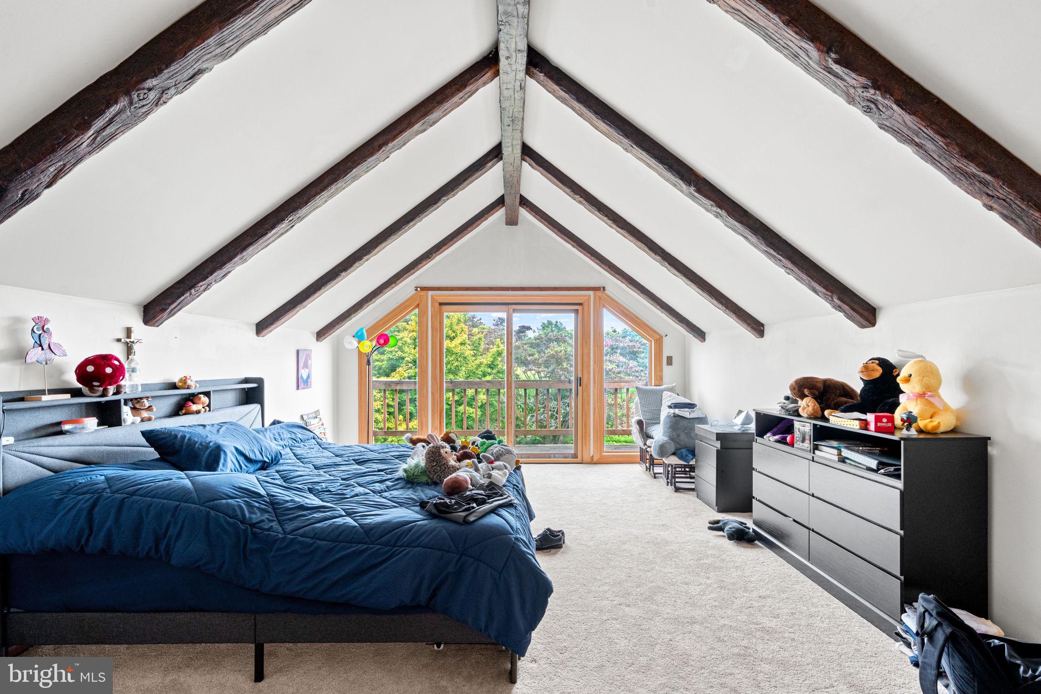 170 Sunset Road Oxford, PA 19363 - Photo 29 of 70 a bed room with a bed furniture and a large window