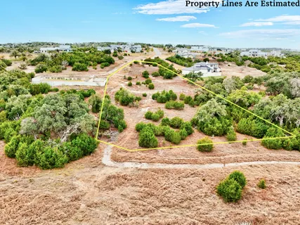 a view of a yard with an ocean