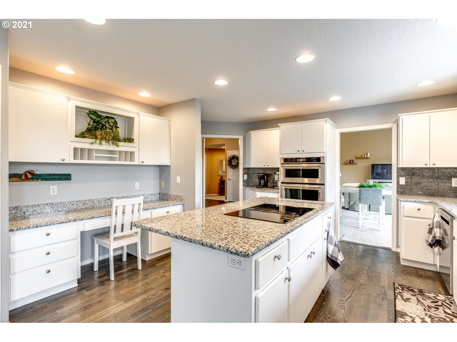 2170 South 26th Avenue Ridgefield, WA 98642 - Photo 12 of 32 a kitchen with stainless steel appliances granite countertop a sink stove and refrigerator