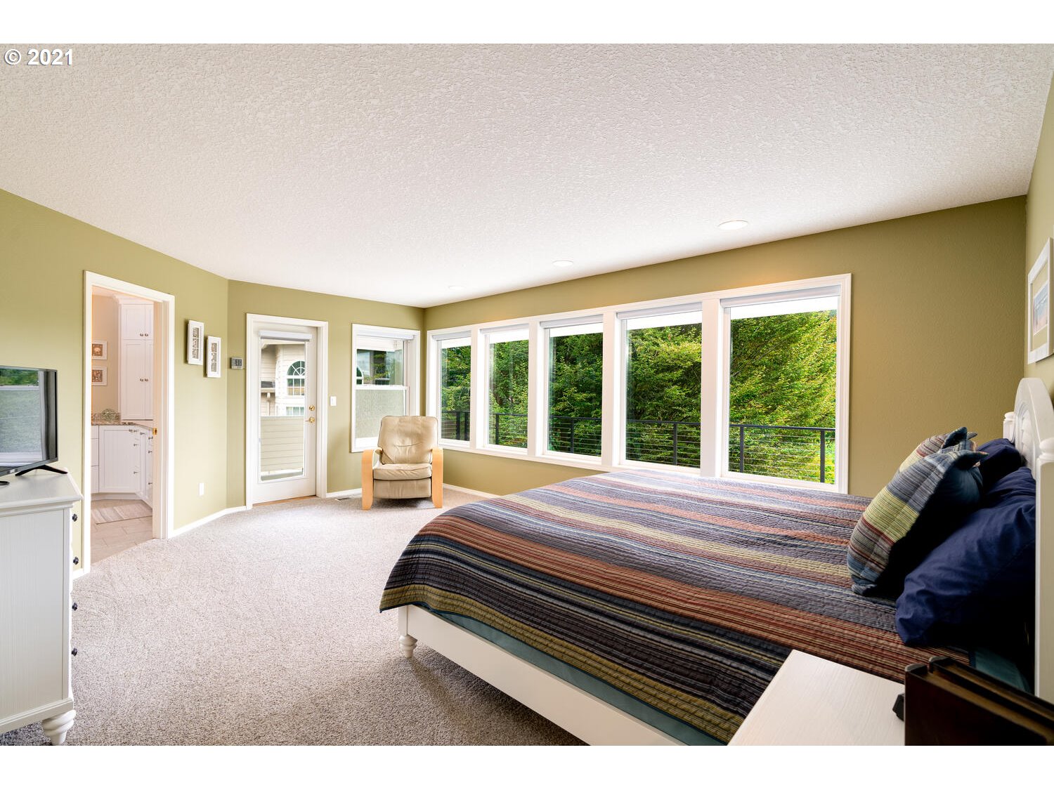 2170 South 26th Avenue Ridgefield, WA 98642 - Photo 14 of 32 a bed room with a bed and a large window