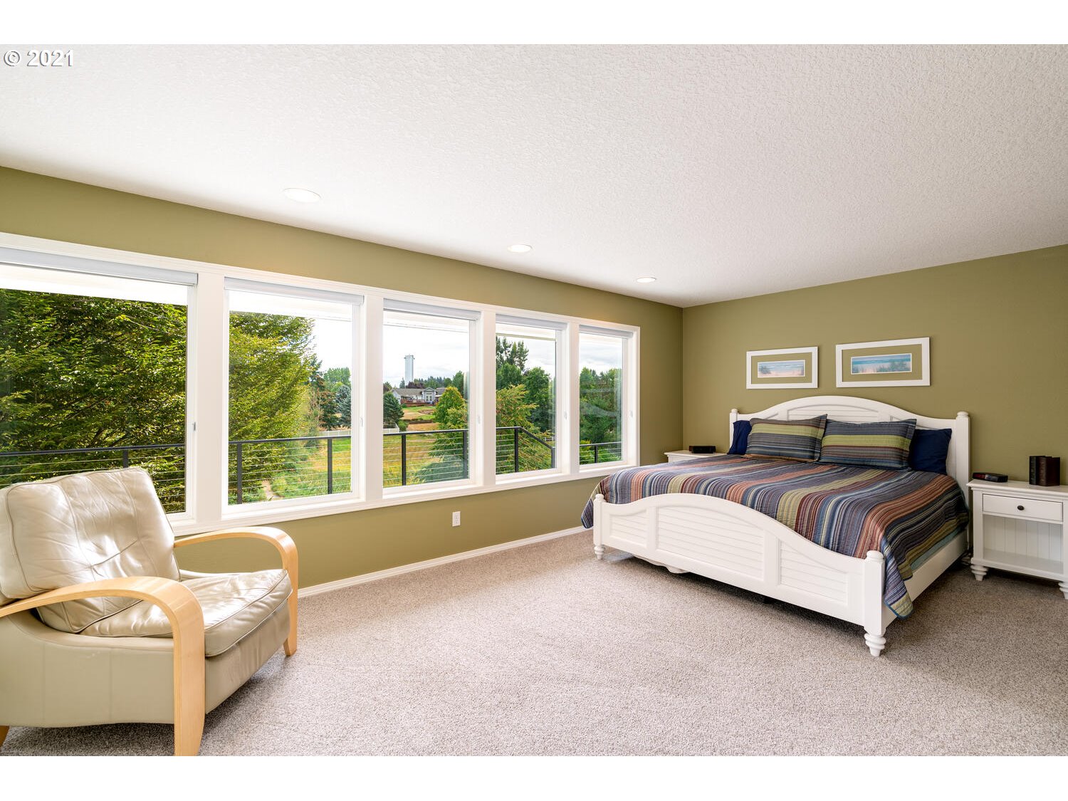 2170 South 26th Avenue Ridgefield, WA 98642 - Photo 15 of 32 a spacious bedroom with a bed and a large window