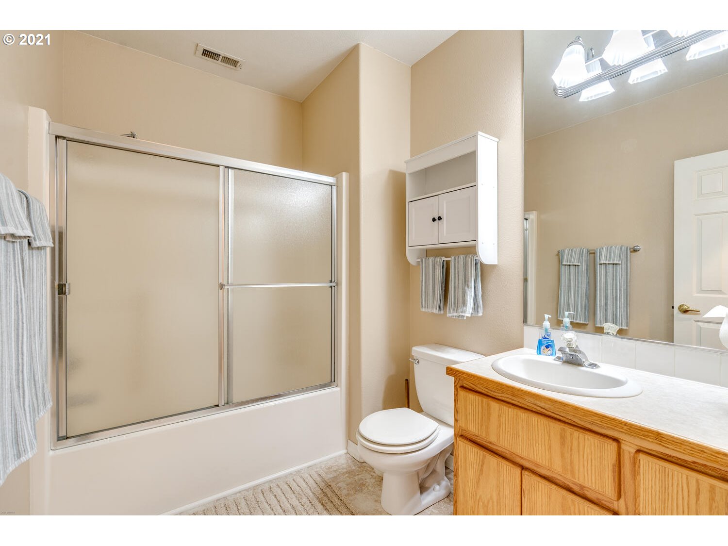 2170 South 26th Avenue Ridgefield, WA 98642 - Photo 24 of 32 a bathroom with a sink a toilet and shower