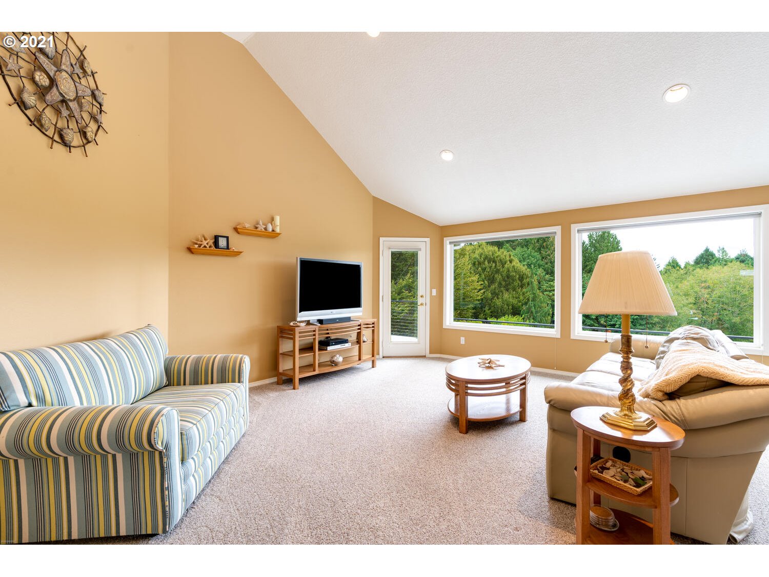 2170 South 26th Avenue Ridgefield, WA 98642 - Photo 7 of 32 a living room with furniture and a flat screen tv