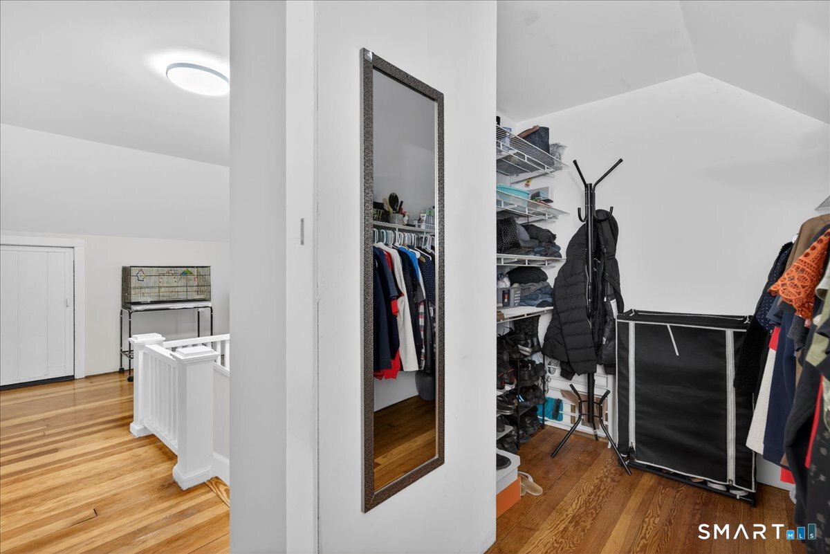 35 Marcel Street Bridgeport, CT 06606 - Photo 17 of 40 a view of walk in closet with clothes and shoes