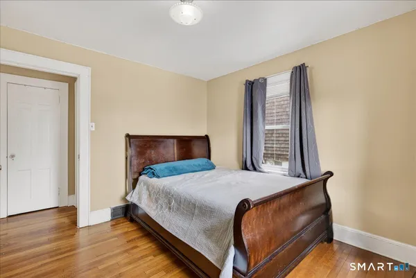 a bathroom with a sink toilet and mirror