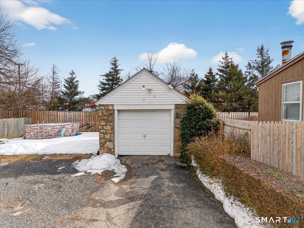 35 Marcel Street Bridgeport, CT 06606 - Photo 7 of 40 a view of a house with a yard and large tree