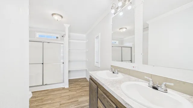 a bathroom with a sink and a mirror