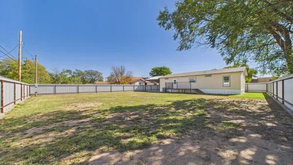 a view of outdoor space and yard