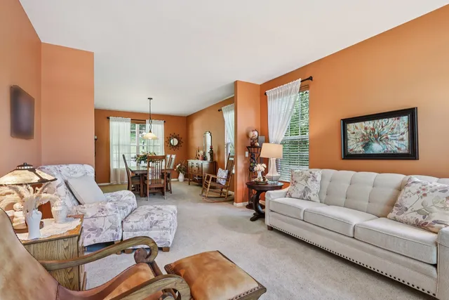 a living room with furniture or couch and a flat screen tv