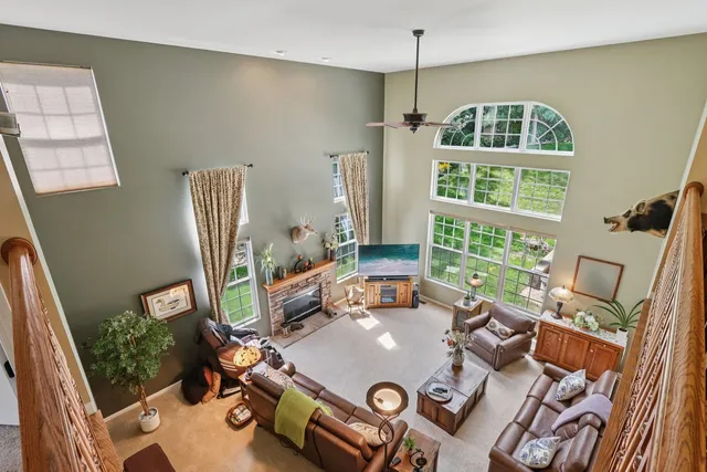 a workspace with furniture and window