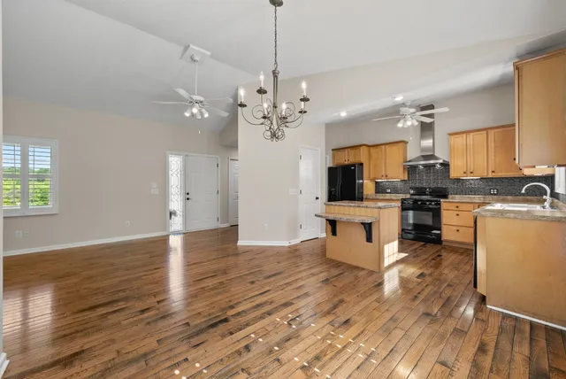 a bathroom with a sink a mirror and a vanity