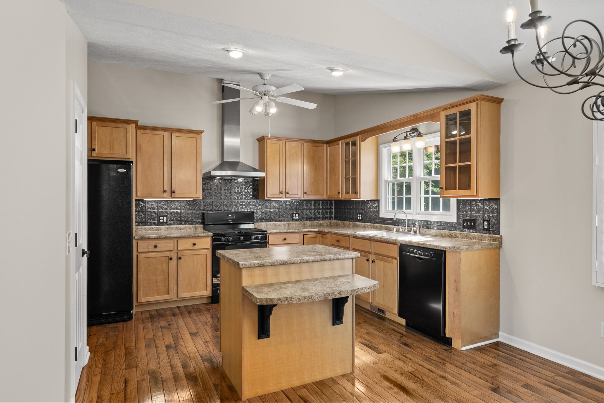 202 Partridge Point Cadiz, KY 42211 - Photo 14 of 100 a kitchen with stainless steel appliances granite countertop a stove and a sink
